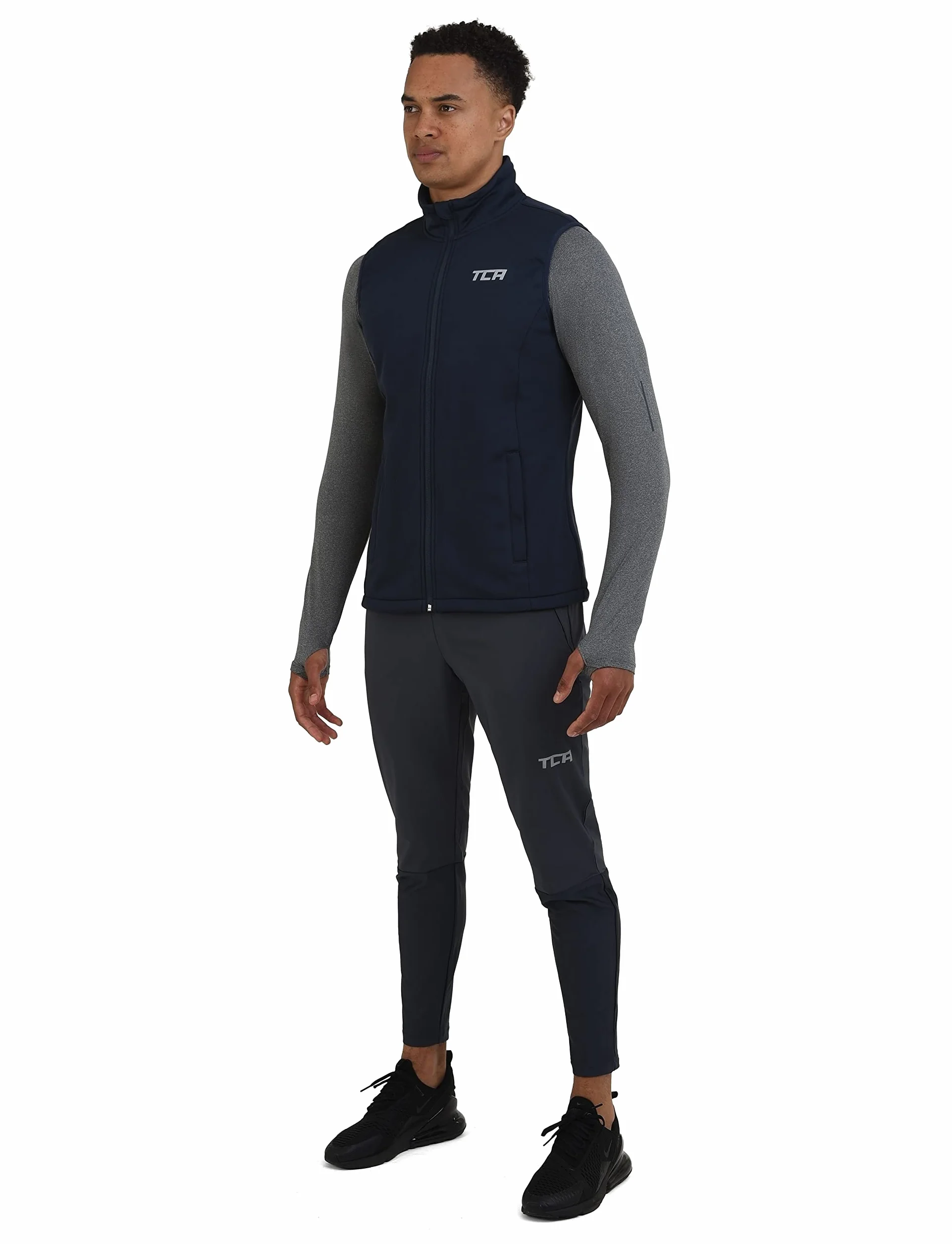 TCA Chaleco Cortavientos Running y Ciclismo, y de Deso pluma, Con Bolsillos Con Cremallera Para Hombre