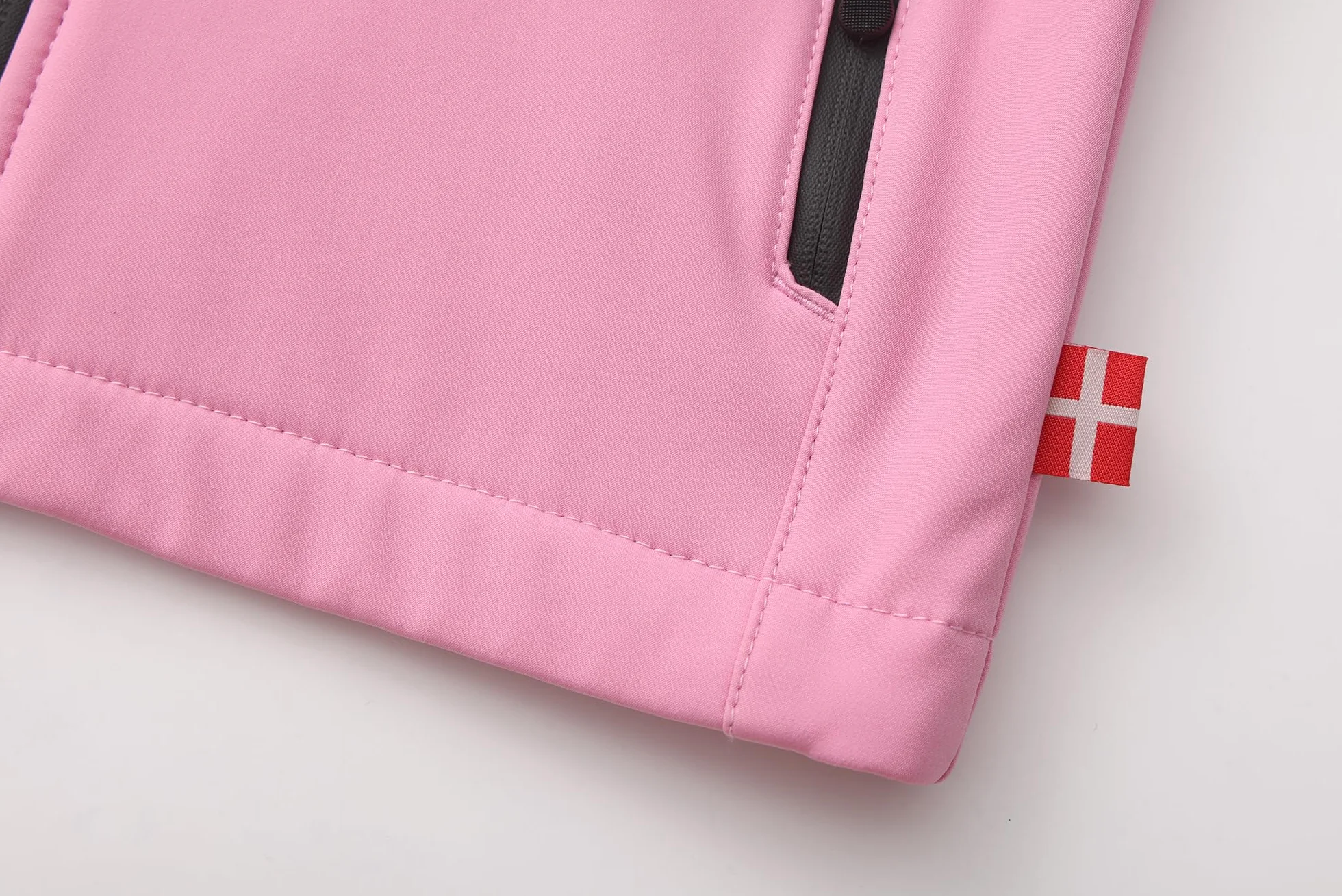 Chaqueta softshell cortavientos con capucha para niños y niñas, forro polar. Material impermeable de 5000 mm sin PFC minimizado de contaminación.