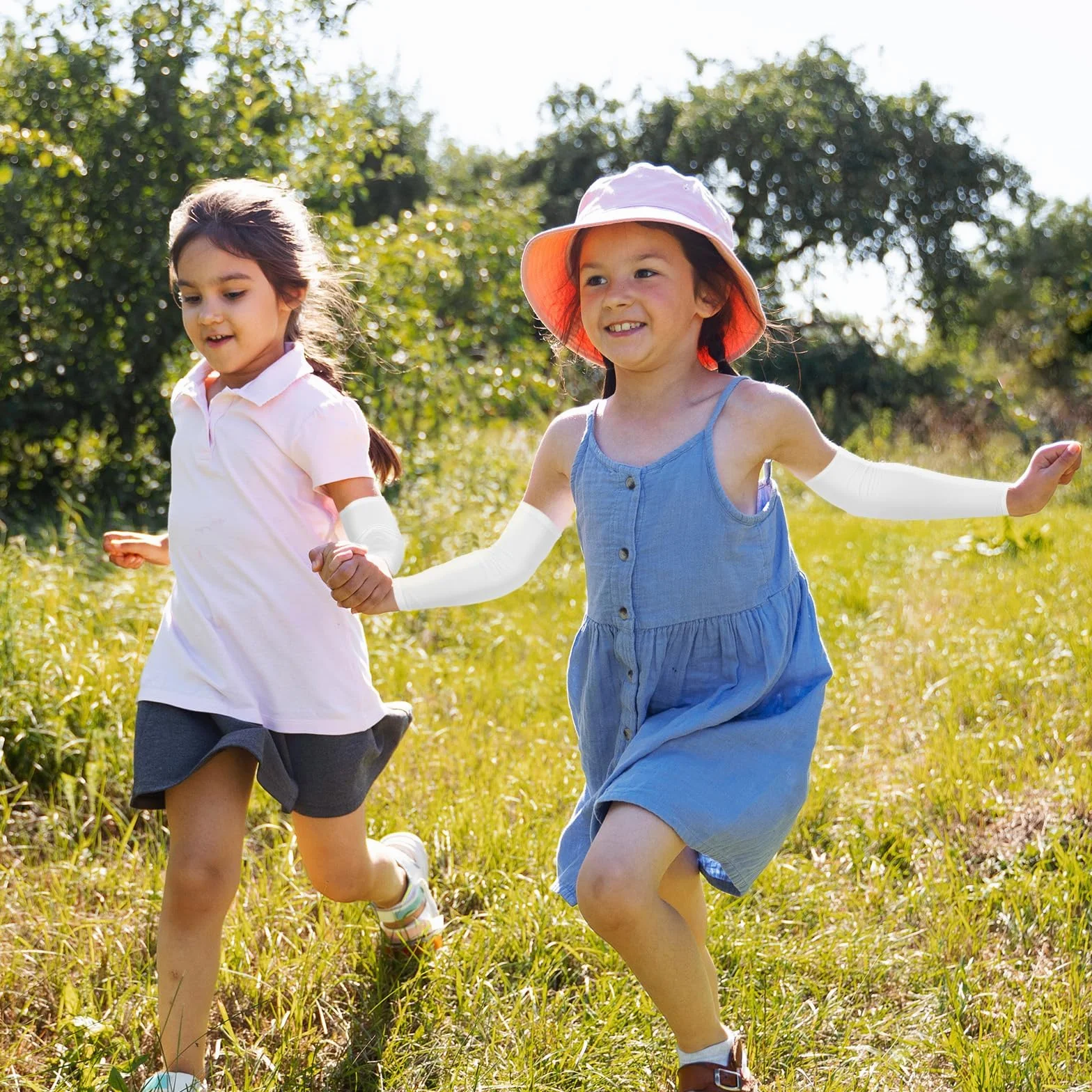 Mangas de Brazos para Niños,2 Pares Mangas Enfriamiento de Protección Manga Protectora Solar Transpirable Anti UV Manguitos Ciclismo Running Compresión para Niños Niñas